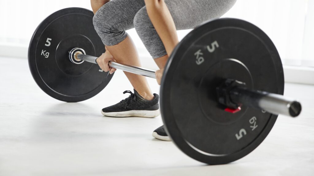 close up hands holding bar